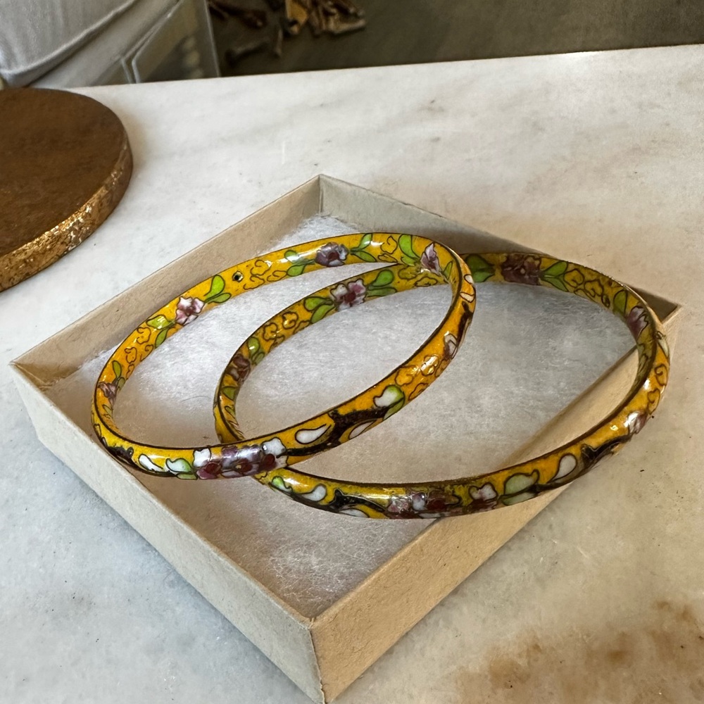 Vintage Chinese cloisonné bangle bracelets with a yellow floral design